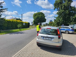 Policjant podczas działań Niechroniony Uczestnik Ruchu Drogoweg